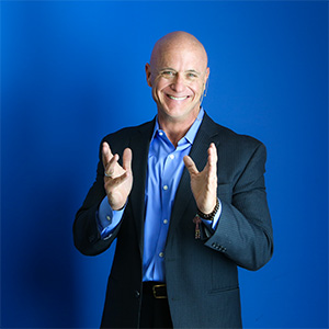 Will Bowen gesturing during a professional studio portrait